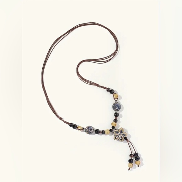 Boho-Chic Adjustable Ceramic Bead Necklace with Floral Design - Picture 3 of 5